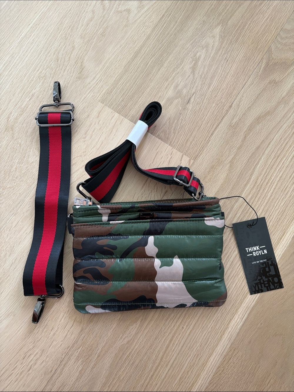 THINK ROYLN Camouflage Quilted Crossbody with one long and one short strap.